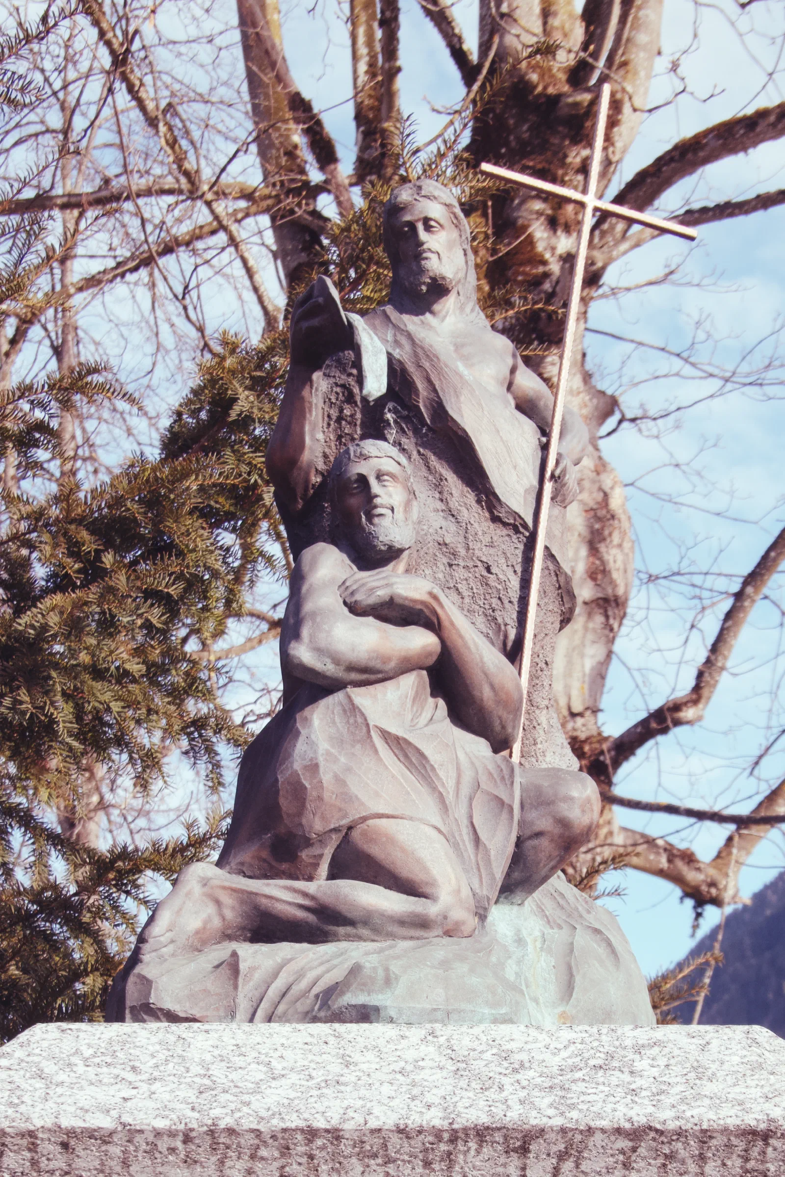 Statue against a blue sky