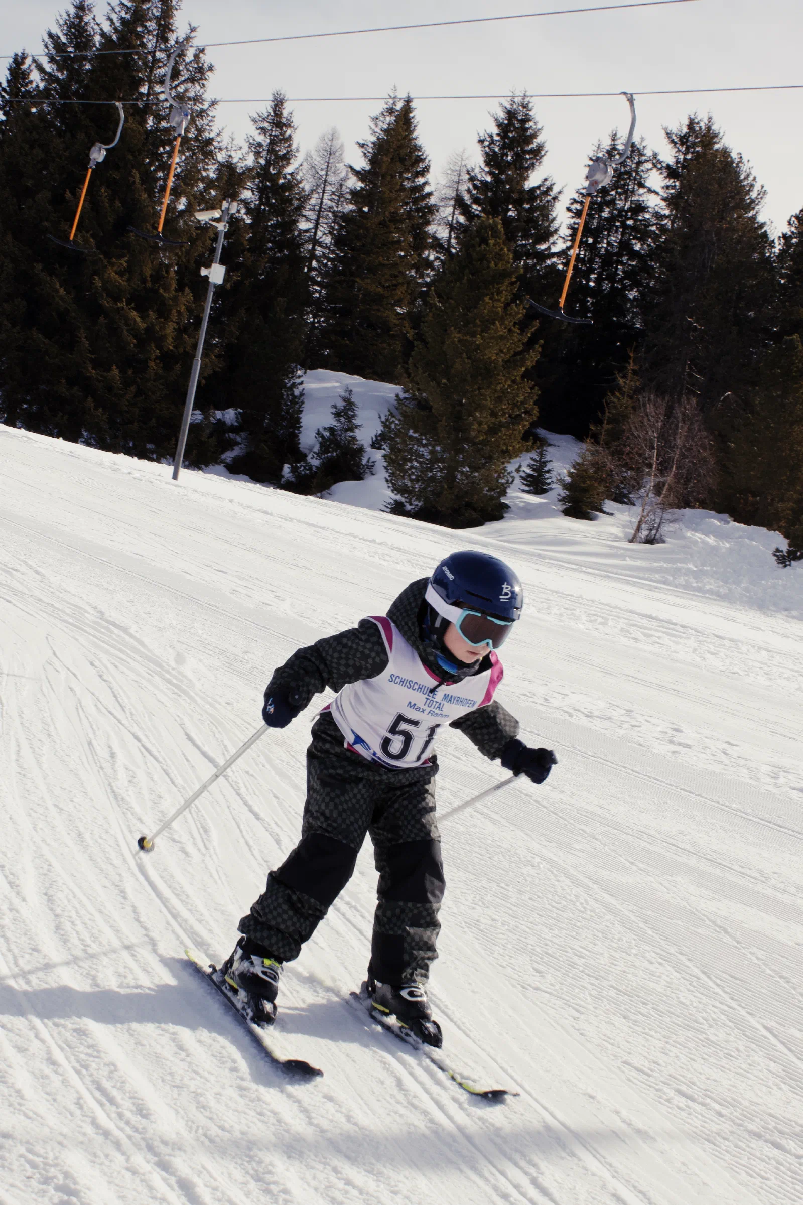 Tilian in ski gear at the finish line