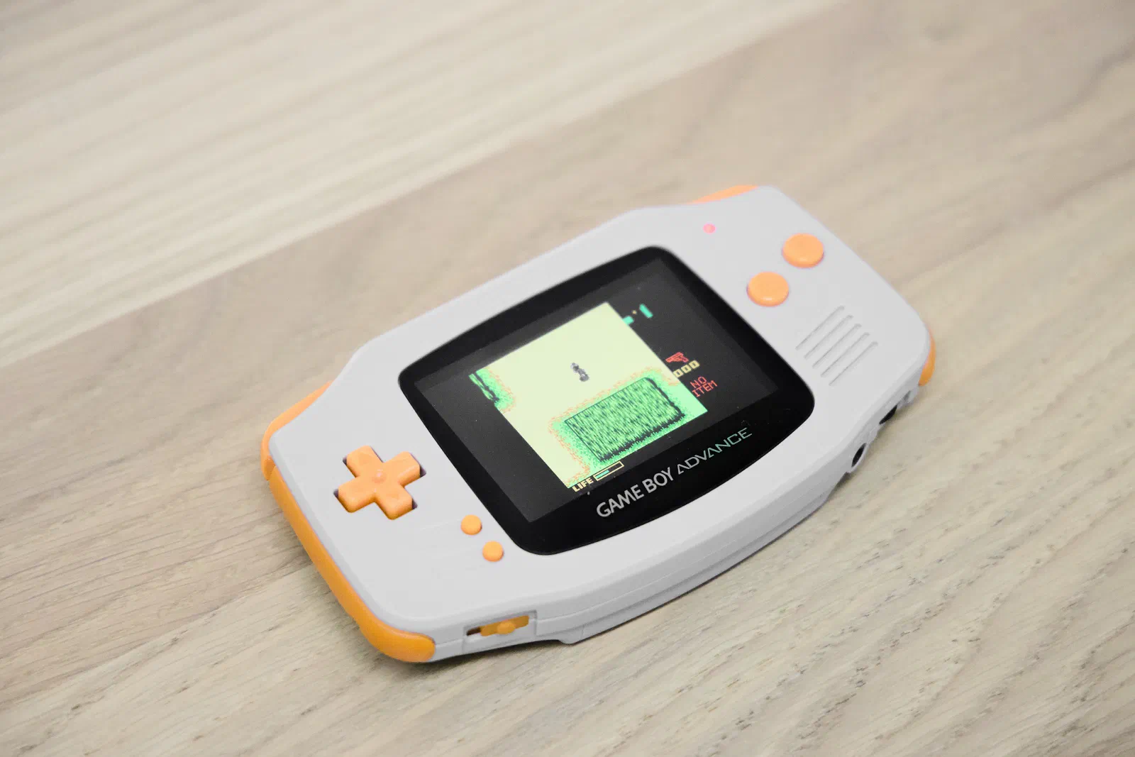 Modded Game Boy Advance running Metal Gear: Ghost Babel