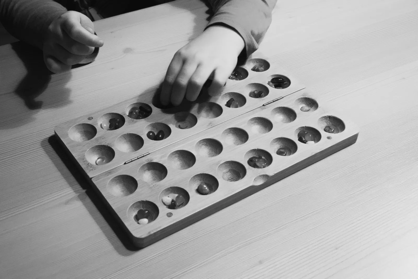 Hus board game on a wooden table