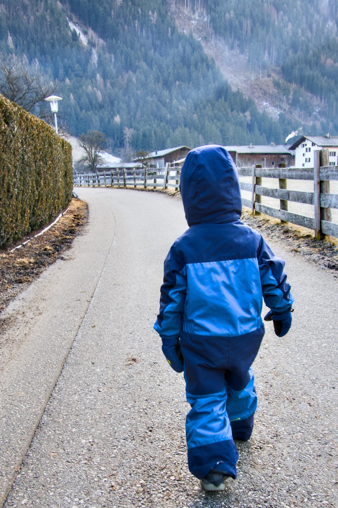 Kellin walking along a fence