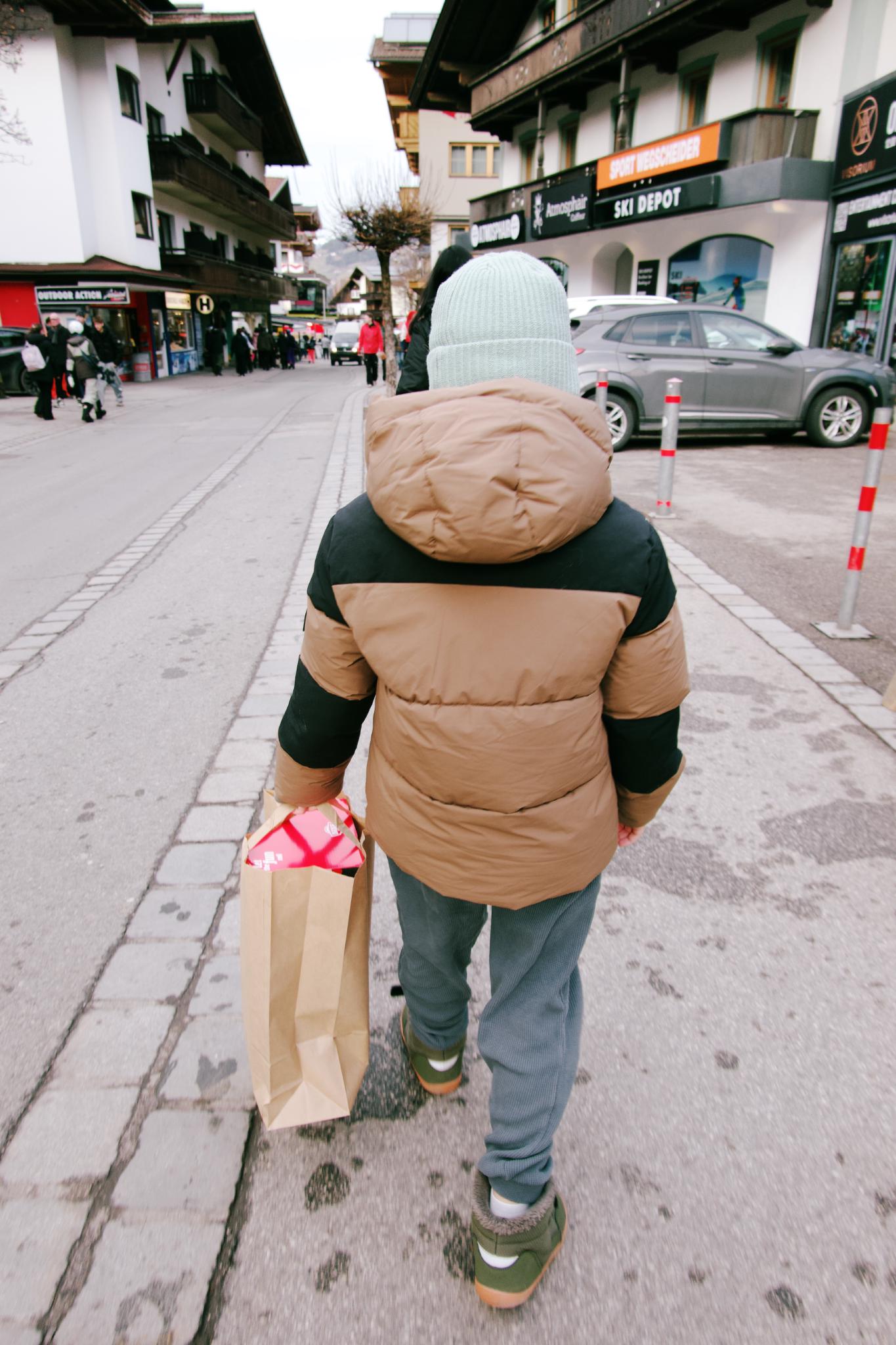 Walking through Mayrhofen on the way to the toy store