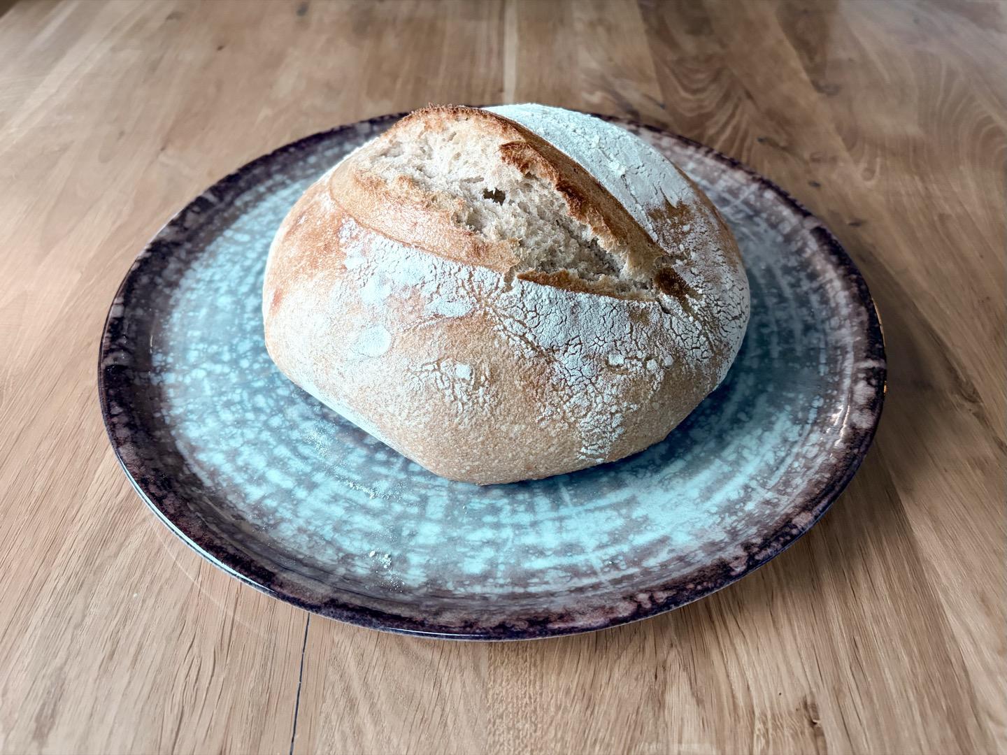 Spelt sourdough bread on a ceramic plate